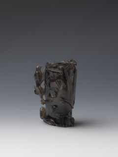 Vase on base, carved ornaments, carved decoration: stylized rocks; flowers ornament; birds