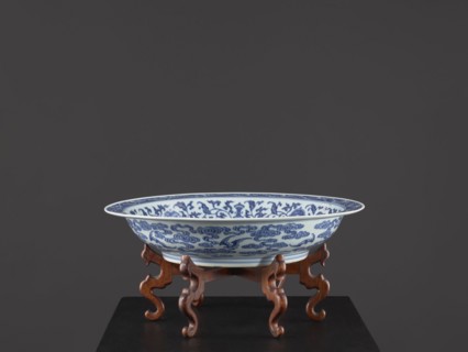 Platter on stand, Blue-and-white porcelain platter on a low foot with a wide rim, sitting on a