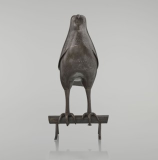 Falcon on a branch, Islamic art, Persian culture, sculpture/figurine of a bird falcon, feathers,