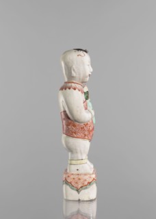 One of the Hehe Er Xian brothers holding a vase with lotus buds; maker, Chinese; Qing dynasty,