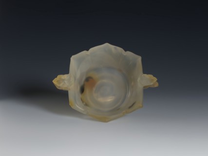 Bowl, 19th century, Qing 1644–1911, China. Spotted agate vessel with yellow-rusty stains and black