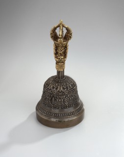 Bell;, Bowl with a lambrequin border with mascarons. Handle with a bust of a Bodhisattva carrying a