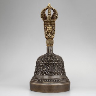 Bowl with a lambrequin border with mascarons. Handle with a bust of a Bodhisattva carrying a vajra.