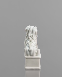 Fo lion figurine with a ball;, lion iconography; ceramics; blanc de Chine porcelain; figurine;