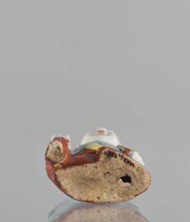 Boy with ruyi — incense burner., Chinese; colored porcelain; Ming; 19th century; subject: boy