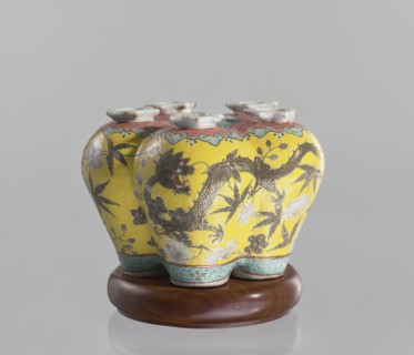 Vase in the shape of five connected vases on a base; maker, Chinese; colored porcelain with dragons