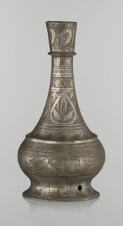Bottle, Islamic art, Arabic culture, geometric ornament, plant motifs. Neck slender towards the