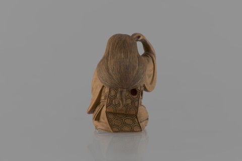 Netsuke in the shape of a nô theater actor wearing an Okame mask, Hôjitsu fl. ca. 1800–1860