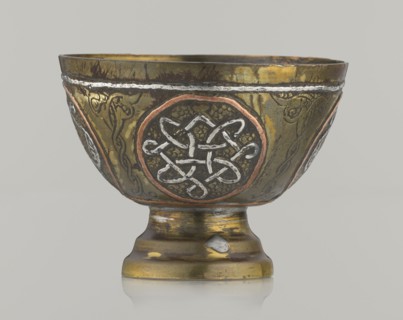 Bowl, Islamic art, Arabic; Decoration with braided and arabesque motifs in cartouches. Background