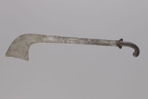 Sabre of the bark type, With a curved hilt and similar expanded engraving. Decorated with