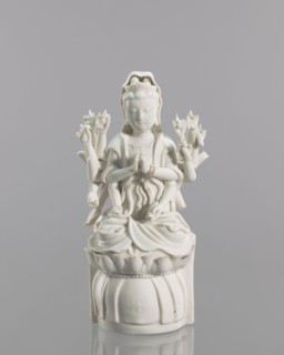 Guanyin on a lotus throne, Chinese, Blanc de Chine porcelain, 18th century, Fujian, China;