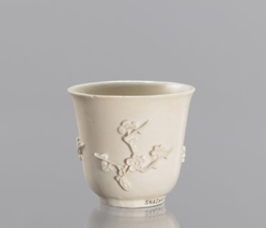 Bowl, decorated with plum trees, porcelain blanc de Chine, 19th century China; ceramic decorative