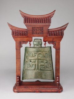 Bell on a stand in the shape of a paifang gate. Chinese; Qing 1644–1911. Bronze zhong-type bell