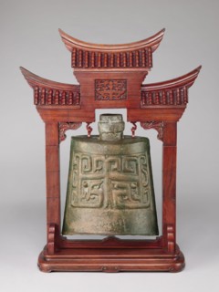 Bell on a stand in the shape of a paifang gate., Chinese art; Chinese culture; Qing 1644–1911.