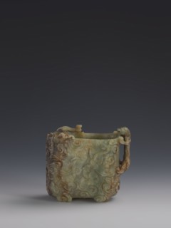 Vessel, Chinese, Qing dynasty 1644–1911. Early 18th century. Gray-green jade, hollowed. Tall vessel