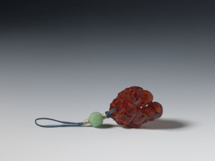 Grape wine pendant, pendant of fossil amber carved with grapes; Chinese, Qing dynasty 1644–1911,