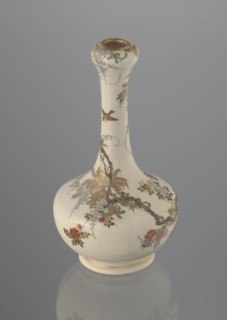 Onion-shaped vase with a low ring foot and long slender neck bulging at the spout, decorated with a