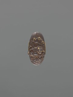 Sword hilt cap kashira, ; decorated with demons Oni and lightning; Japanese, Edo period 18th