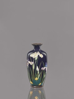 Vase, Ovoid vase with a short, thin, flared neck decorated with irises on a dark blue background.