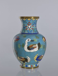 Vase, Cloisonné enamel vessel on a foot with a neck. Decoration: ducks on a turquoise background;