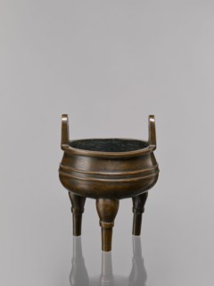 Ding-type incense burner on a stand, Qing dynasty 1644–1911, 19th century, China. Bronze ceremonial