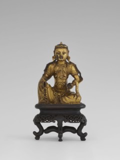Bodhisattva Manjushri, on a base. Chinese; Qing dynasty 1644–1911. Wood sculpture with wooden stand