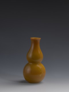 Vase, Chinese, Qing dynasty 1644–1911, 18th century. Double-gourd form, yellow opaque glass, cast