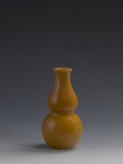 Vase, Chinese, Qing dynasty 1644–1911, 18th century. Yellow glass, cast and cut, opaque; double