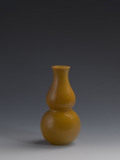 Vase, Chinese, Qing dynasty 1644–1911, 18th century. Double-gourd form vase made of yellow glass,