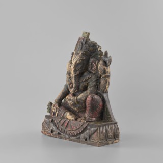 Ganesha, late 18th century, Nepal; sculpture of Ganesha with lotus iconography, elephants, axe,