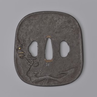 Crossguard tsuba, Kaneie craftsman, Japanese, Edo period 18th century. Tsuba in the shape of a