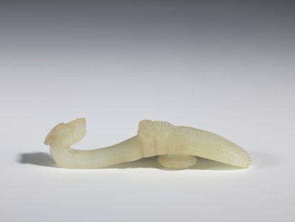 Belt clasp, Chinese, Qing dynasty 1644–1911, 18th–19th century. Milky-white translucent jade.