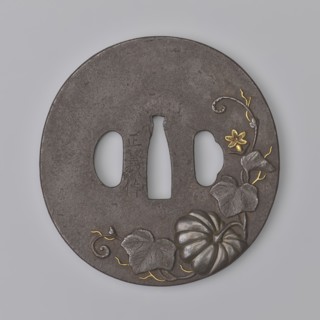 Crossguard tsuba, Masayoshi. Round tsuba maru gata with a rectangular edge kaku mimi, decorated on