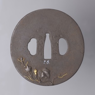 Crossguard tsuba, Masayoshi. Round tsuba maru gata with a rectangular edge kaku mimi, decorated on