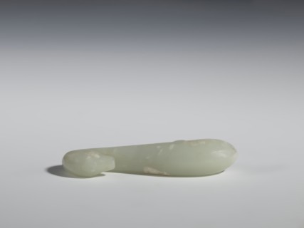 Belt clasp, Chinese, Qing 1644–1911, 17th–18th century. Milky-white slightly translucent jadeite,