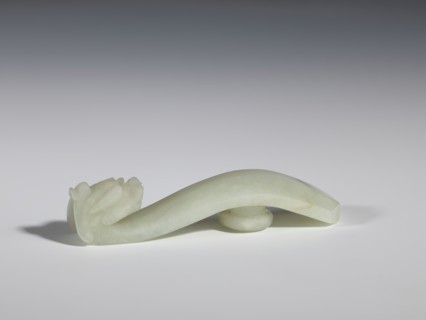 Belt clasp, stones; Chinese, Qing 1644–1911, 18th–19th century. Milky-white jade with colloid