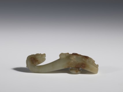 Belt clasp, Chinese, Qing 1644–1911, 17th–19th century. Jadeite with traces of chalcedony. Handle