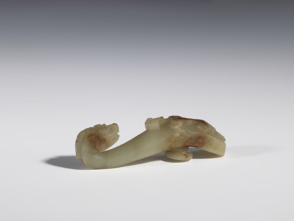 Belt clasp, Chinese, Qing 1644–1911, 17th–19th century. Jadeite with traces of chalcedony. Handle