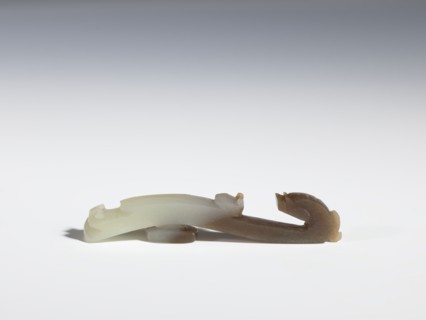 Belt clasp, Chinese, Qing 1644–1911, 17th–18th century. Gray-beige jadeite with chalcedony
