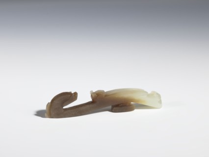 Belt clasp, Chinese, Qing 1644–1911, 17th–18th century. Gray-beige jadeite with chalcedony