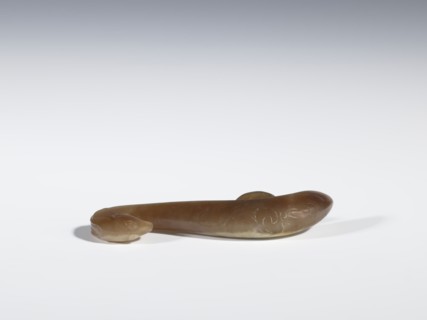 Belt clasp, Chinese, Qing 1644–1911, 18th–19th century. Brown jade with lighter spots, full-plastic