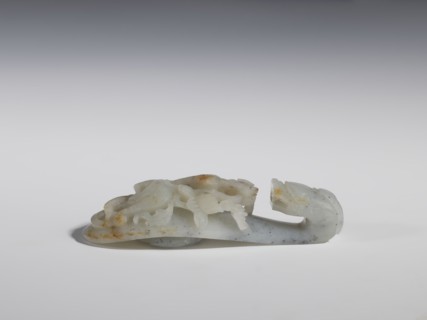 Belt clasp. Stem: lizard-dragon on a peony branch. Underside knob in the shape of a five-petaled