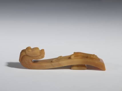 Belt clasp, Chinese; Qing 1644–1911; 18th–19th century. Materials and technique: brown chalcedony;