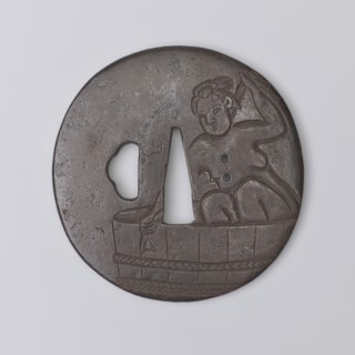 Crossguard tsuba, Yoriie,  ; engraved decoration depicting a naked woman bathing in a large tub and