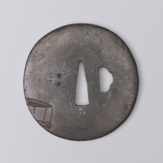 Crossguard tsuba, Yoriie,  ; engraved decoration depicting a naked woman bathing in a large tub and