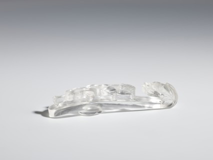 Belt clasp, Chinese; Qing 1644–1911. Rock crystal with inclusions; full-plastic carved head; shank: