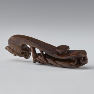 Belt clasp, Chinese, Qing 1644–1911, 19th century. Material/technique: full-sculpture carved head;