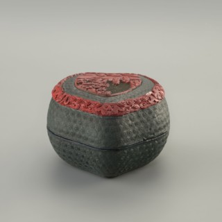 Box with a lid, Chinese, Qing 1644–1911, 19th century. Two-tone lacquer with carved decoration