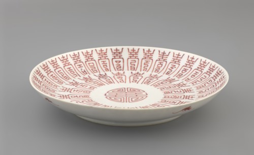 Plate., Porcelain fragment; white glaze with overglaze iron-red decoration of longevity shou
