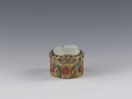 Box with lid, Chinese, Qing dynasty late 19th century. Lid inlaid with a jadeite plaque with a